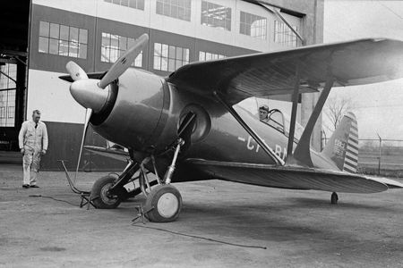 Gregor FDB-1, registration CF-BMB, in its gray paint and striped vertical stabilizer. 