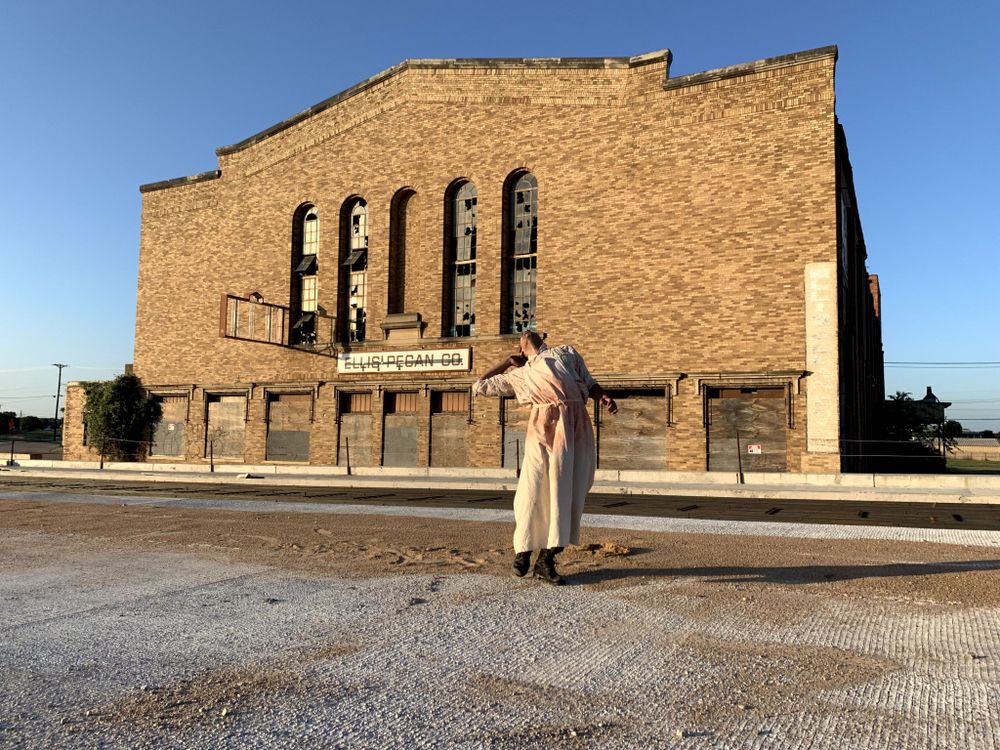 Dancer in front of building