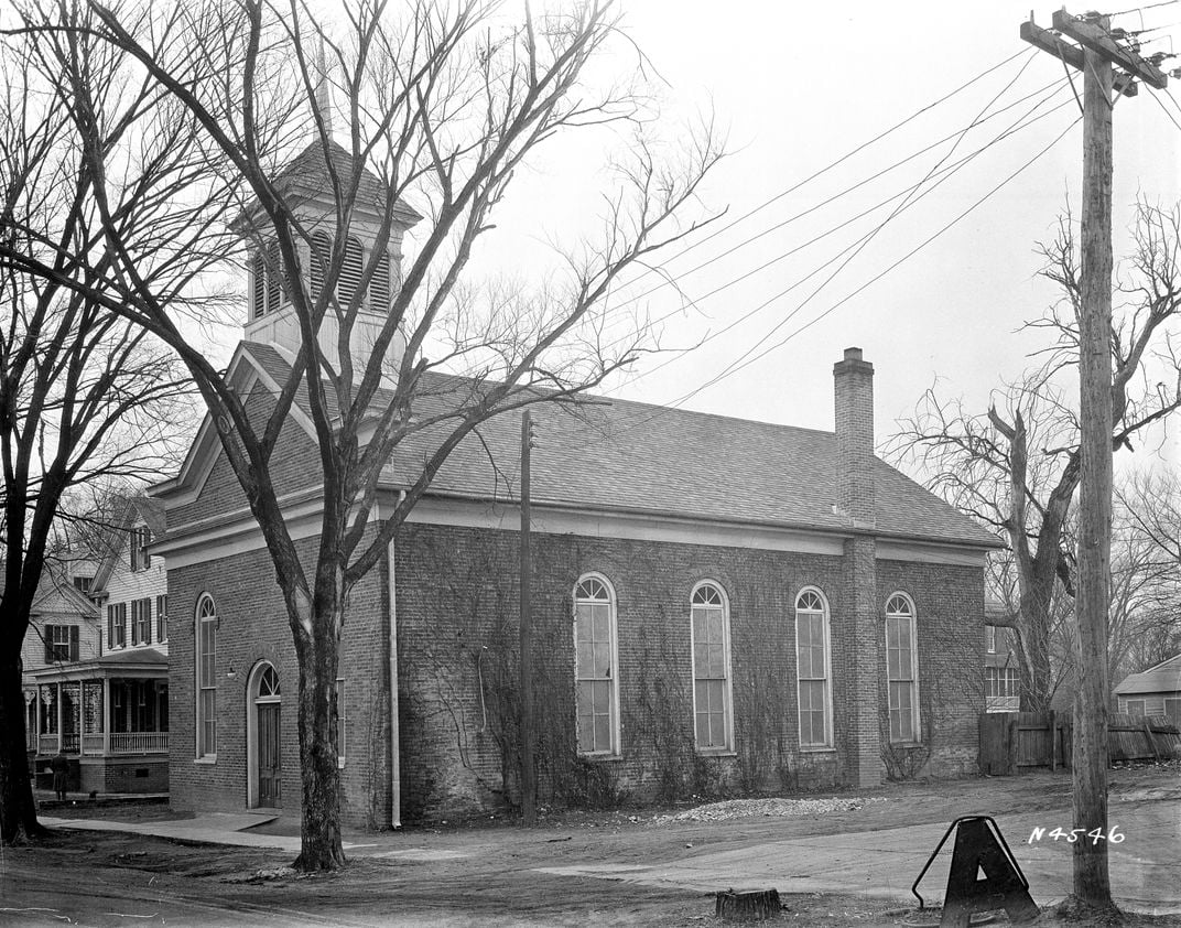 Black and white photo of brick church