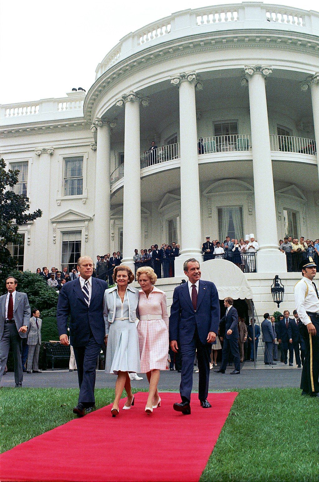 Gerald and Betty Ford walk alongside Pat and Richard Nixon on August 9, 1974.