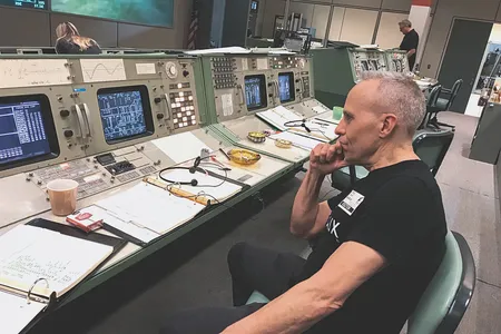 Examining the Mission Control set before a shoot on “For All Mankind,” Drexler is now a designer for the sci-fi series “The Orville.”