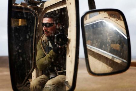 A photographer with Reuters, Finbarr O’Reilly, in southern Afghanistan’s Helmand province during 2011
