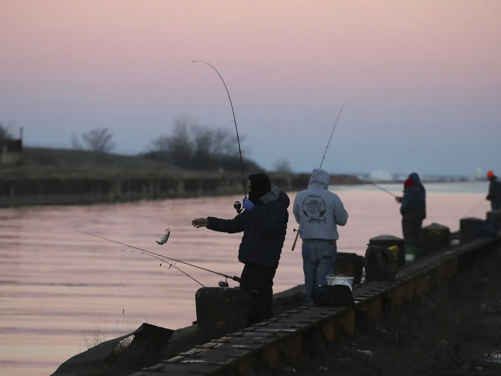 People fishing on Lake Michigan in Chicago