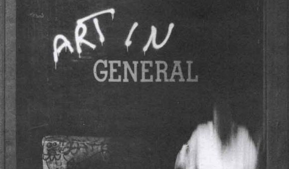 Detail of poster with grayscale image of storefront and blurry figures
