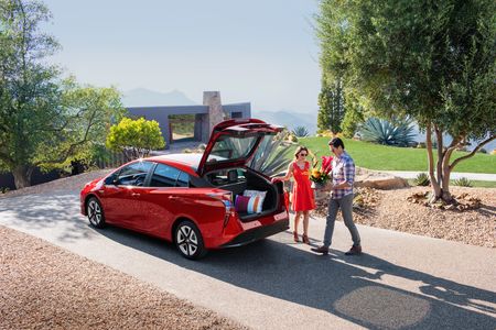 Four Touring shown in Hypersonic Red with available Premium Convenience Package. Prototype shown with options. Production model may vary. Extra-cost color.