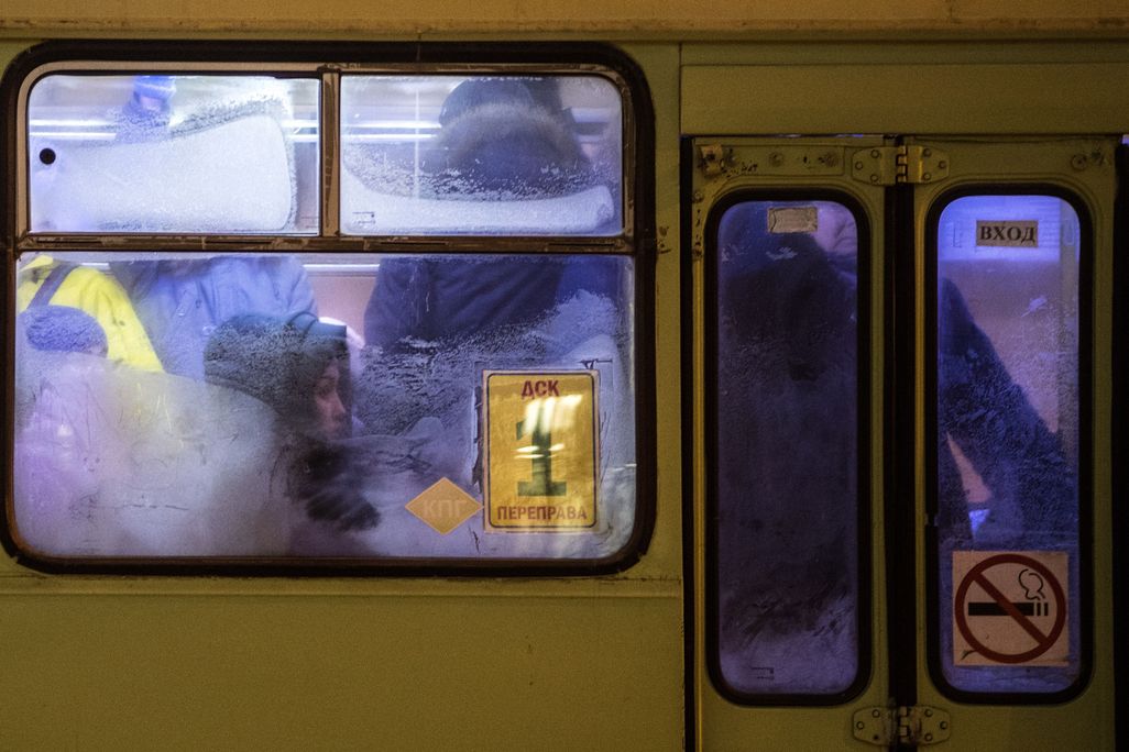 Commuters behind frozen bus windows in Yakutsk