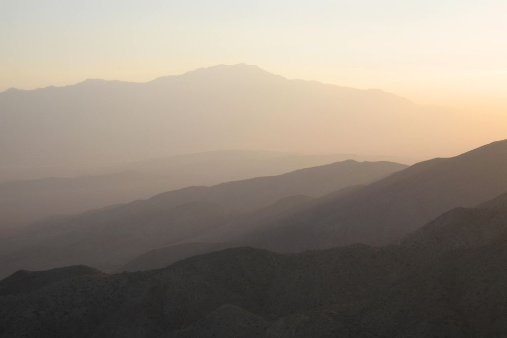 Hazy sunset with mountains