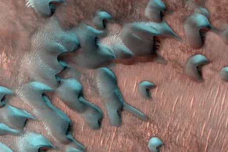 Frost-capped sand dunes near Mars's north pole, captured by the Mars Reconnaissance Orbiter two days after the planet's winter solstice