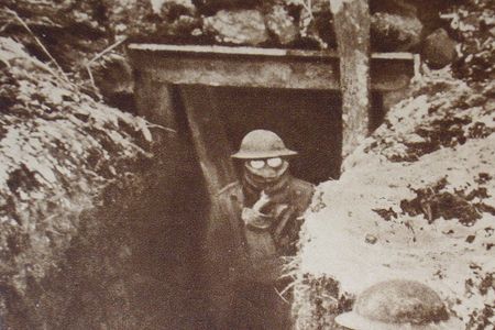 American soldier wearing gas masks in the trenches during World War I