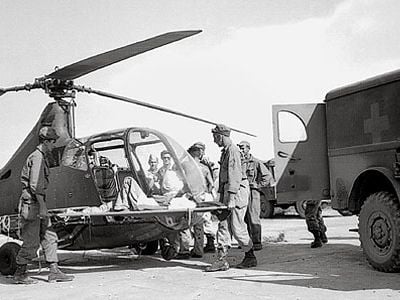 For the wounded on Luzon in 1945, the Sikorsky R-6A transport doubled as an ambulance.
