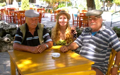American backpacker Julia Pasternack shares a moment with two Turkish gentlemen.