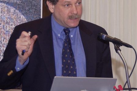 Dr. Eric Lander, Director of the Broad Institute of MIT and Harvard, speaks at the Mouse Genome Sequencing Press Conference on December 4, 2002.