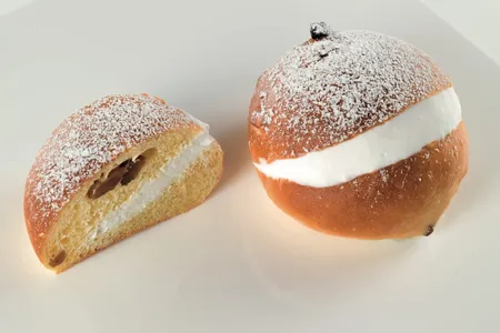 In all its simplicity, the maritozzo is a soft bun filled with a hefty dollop of whipped cream, or panna as it is referred to in Italian.