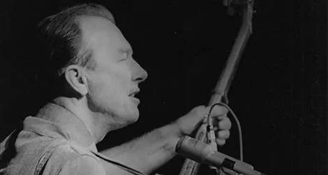 Pete Seeger performs at a peace rally in New York City, 1965.