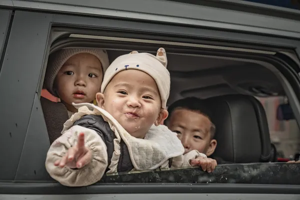 Children at the window thumbnail