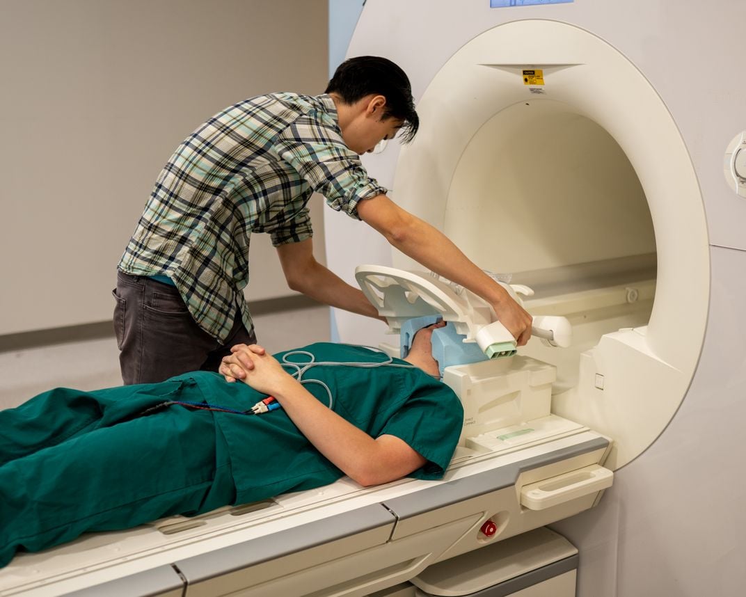 person prepping an MRI participant