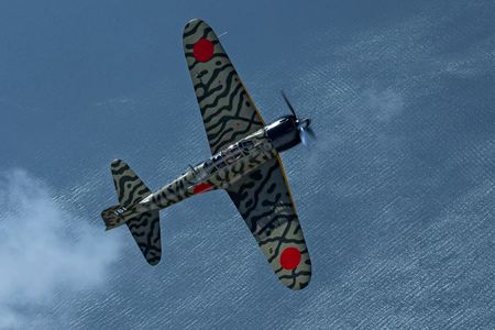 Once the scourge of the Pacific, a Mitsubishi A6M3 Zero cruises placidly over Puget Sound, part of the stunningly restored Flying Heritage air force.