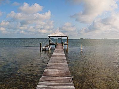 The turquoise water and mangrove islands seen from the dock sold the author on her Sugarloaf Key home.