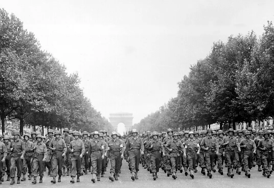 American troops march down the Champs-Élysées on August 29, 1944.