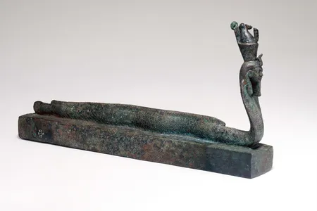 One of the animal coffins, topped with a part-eel, part-cobra, human-headed figure