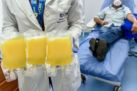 A man who recovered from COVID-19 donates plasma in Bogota, Colombia.