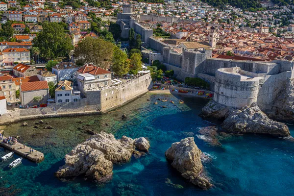 Morning light over Old Walled City and "New" Walled City of Dubrovnik as seen from Fort Lovrjenac thumbnail