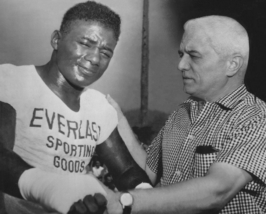 Boxer Floyd Patterson (left) and trainer Cus D'Amato (right) in 1957