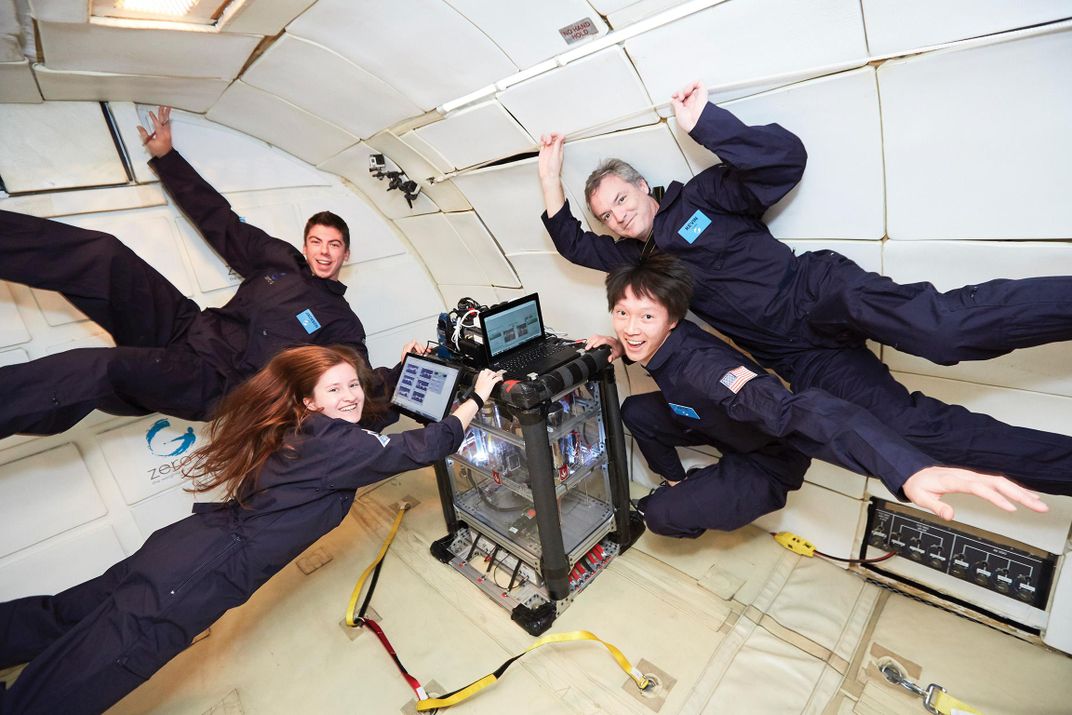 professor and four undergrads on zero-G flight