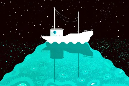 Glowing green waters surrounded a boat in the Arabian Sea.