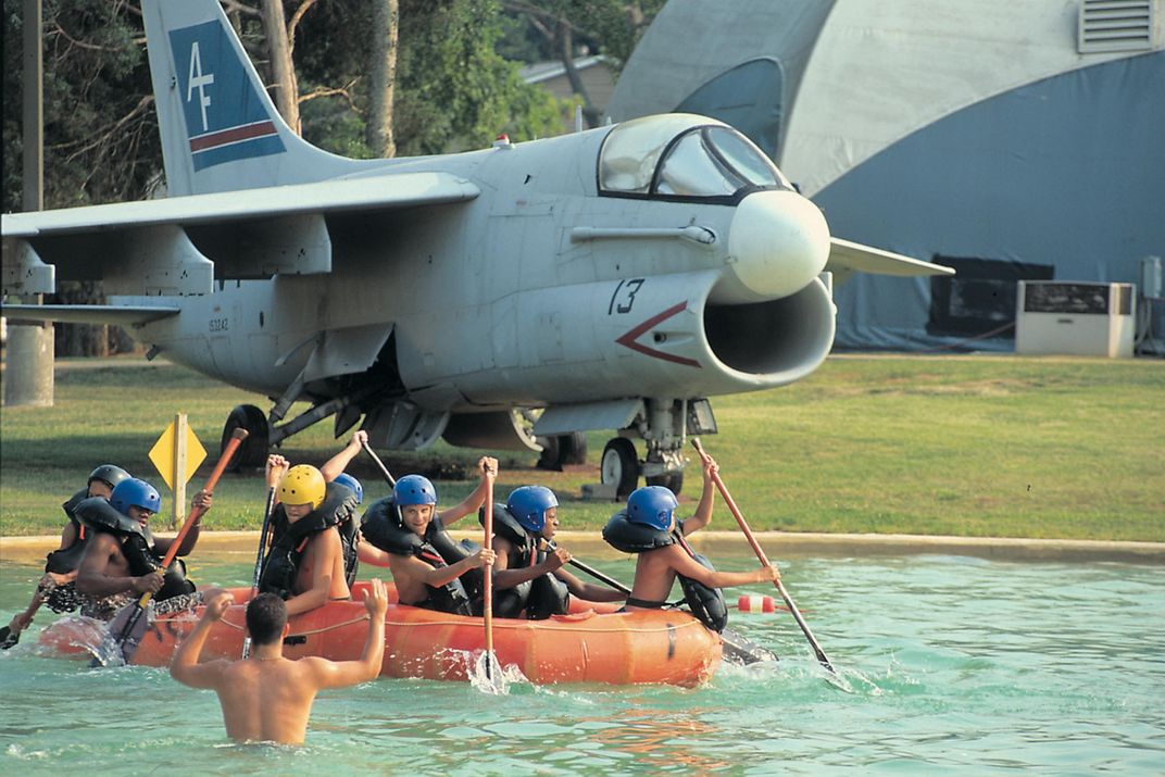 In an Aviation Challenge raft race, competitors learn to work as team.
