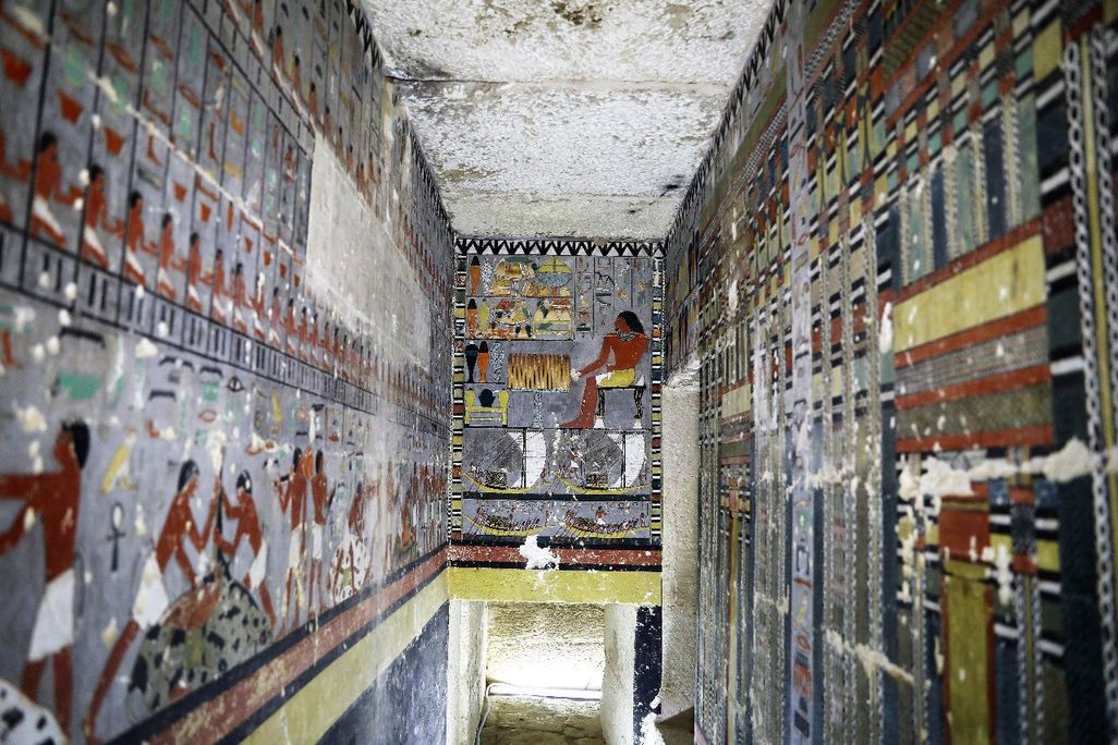 interior of tomb with colorful paintings
