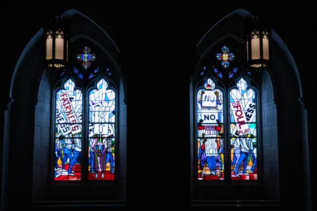 The four colorful panels depict Black Americans holding protest signs.