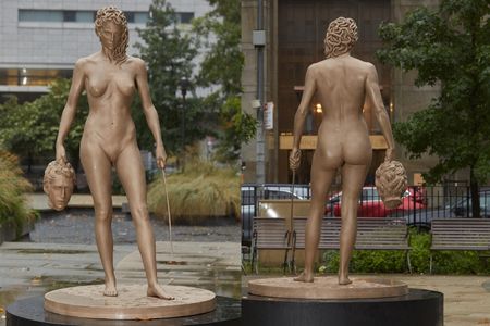 The statue, which stands across from the New York County Criminal Courthouse, inverts the myth of Perseus slaying Medusa.