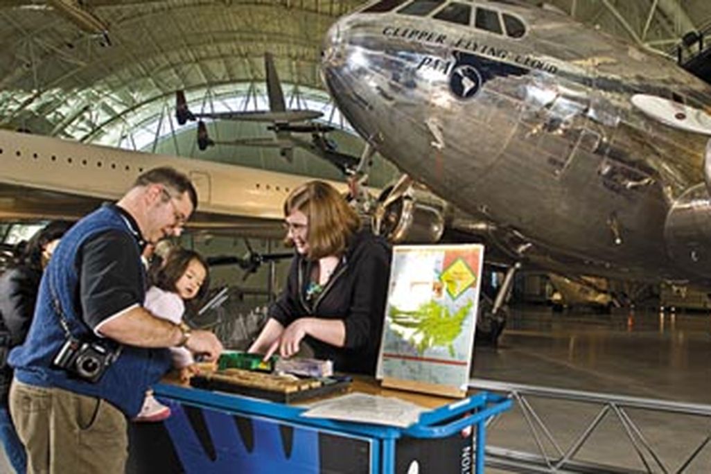 Katherine Peterson teaches visitors about airport codes.