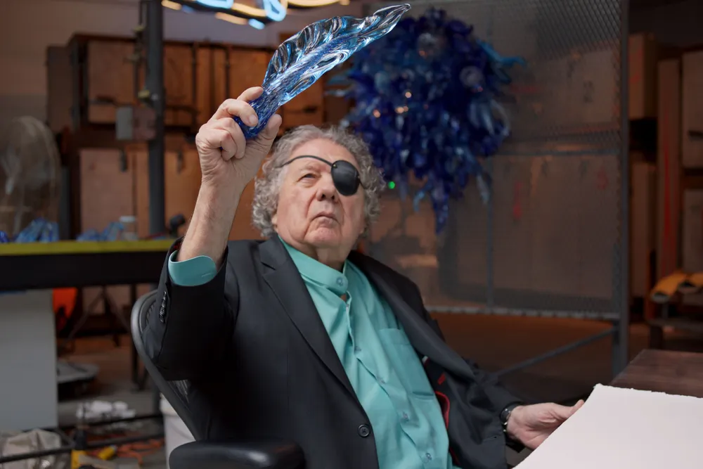 Dale Chihuly looking at glasswork