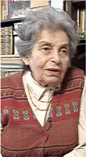 Eliška Kleinová, shown in a 1996 film, survived Auschwitz and returned to Prague, where she continued her own career as a musician.