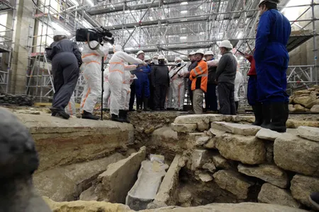 French culture minister officials visits the site of the discovery where an ancient human-shaped sarcophogus was found, among other objects, including sculptures, carvings and a 13th-century altar screen.&nbsp;