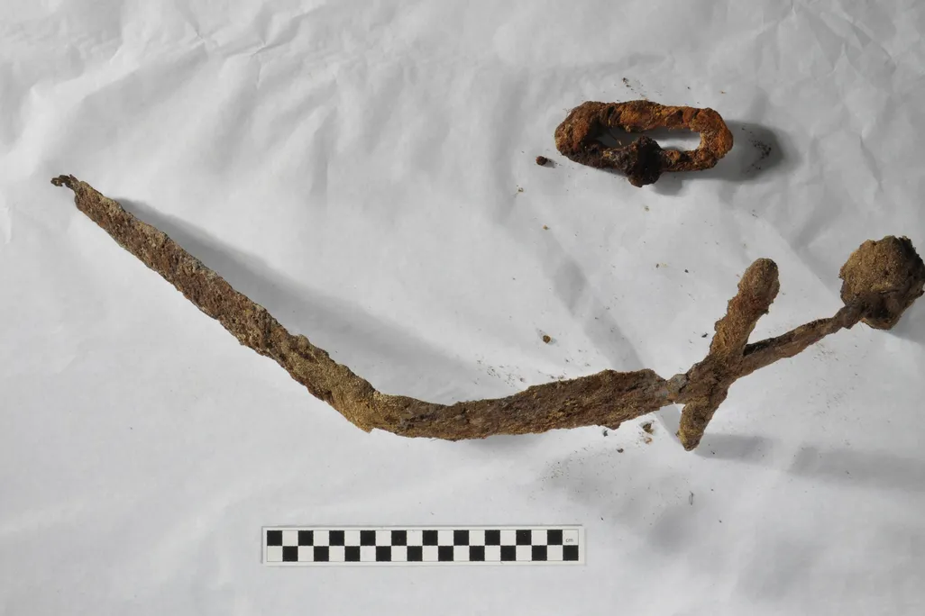 Rusty bent sword