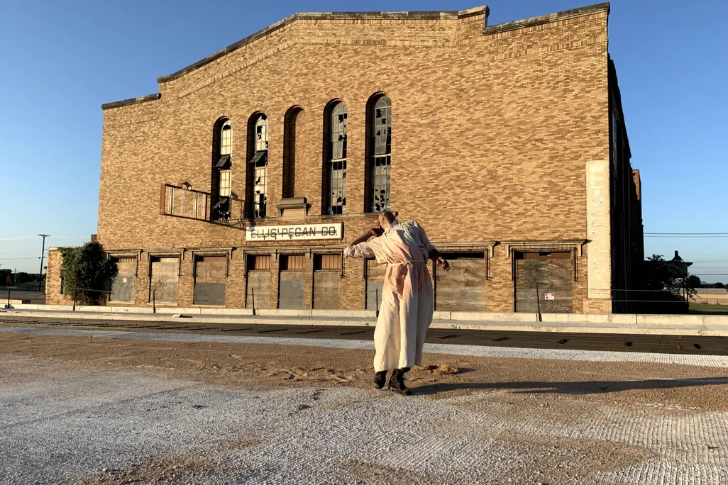 Dancer in front of building