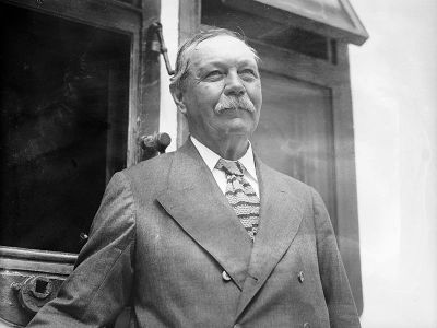 Sir Arthur Conan Doyle, pictured here in 1923, enjoyed using the methods of Sherlock Holmes on real cases. 