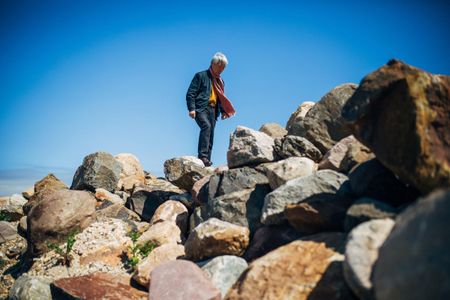 In an interview before the opening of his show, sculptor Lee Ufan (above: searching for materials on Long Island) says the significance for viewers is the "pure experience." 
