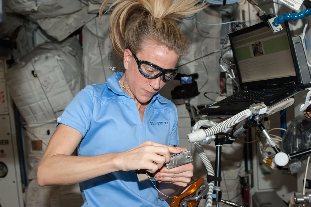 Karen Nyberg works aboard the International Space Station
