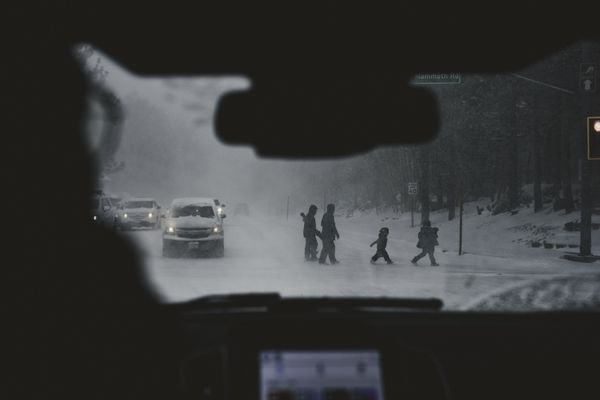 A family crossing the street thumbnail