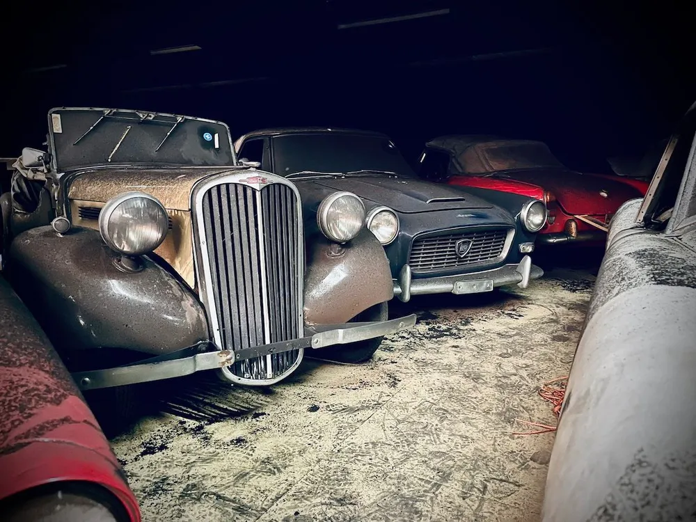 Classic car in dimly lit warehouse