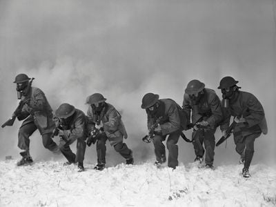 Soldiers of the 44th Division at Fort Dix, New Jersey, in a gas mask drill. The experiments however, exposed troops to chemical weapons without such protection. 