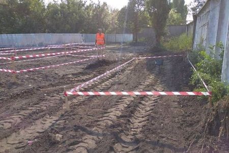 Officials plan to exhume the remains and establish a memorial at the site.