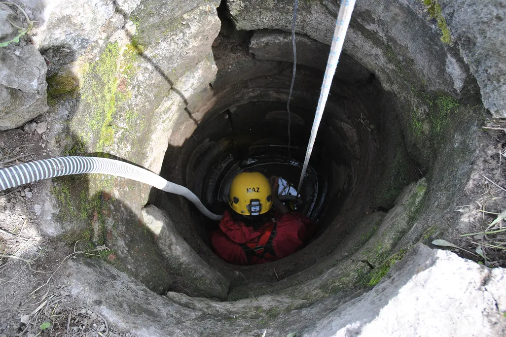 Man in well