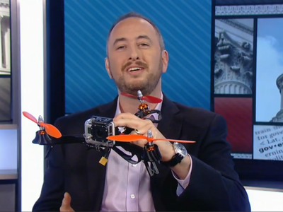 Timothy Reuter with his personal flying robot.