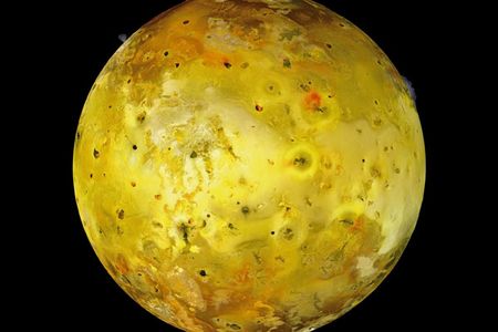 Jupiter’s innermost large moon, Io, is extremely volcanic. “If you look closely on the upper left and upper right horizon, you can see eruptions in the process of happening,” says Benson. “We know that at least 400 volcanos are continuously blasting magma into space from Io.” Mosaic composite photograph. Galileo, July 3, 1999.