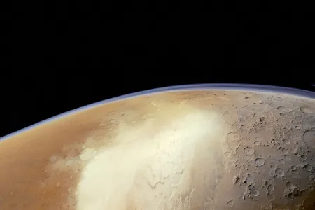 Mars (photographed here by the European Mars Express orbiter) has a thin atmosphere--useful for landers parachuting down to the surface, and the subject of interest for orbiters like the UAE's Hope spacecraft.